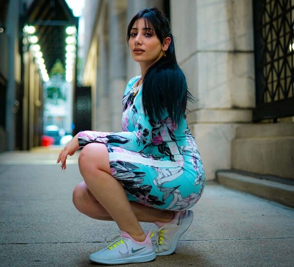 woman wearing Mini Dress and Sneakers for there coffee date